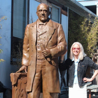 Paula Slater with the Don Salvio Pacheco Bronze Portrait Statue after the patina was applied